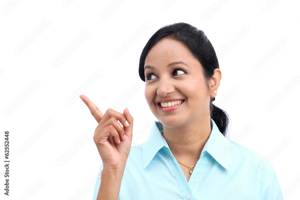 Happy business woman pointing an idea Happy business woman pointing an idea