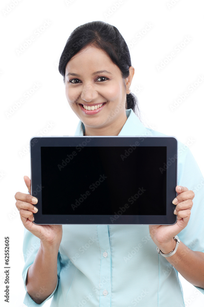 Happy young business woman showing tablet Happy young business woman showing tablet