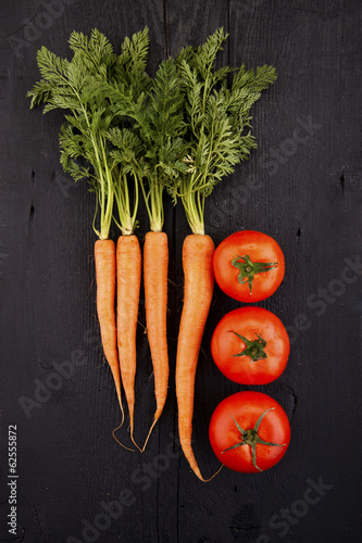 tomatoes, carrots on the table
