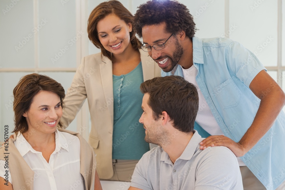 Business people having a conversation in office Business people having a conversation in office