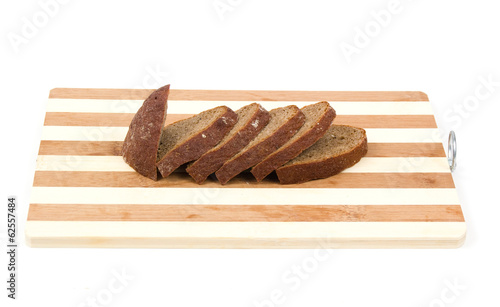 sliced bread on a hardboard isolated on white