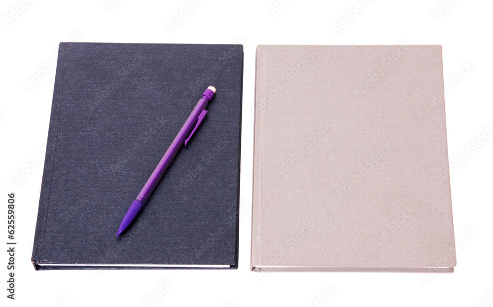 Notepads with pencil on white background Notepads with pencil on white background