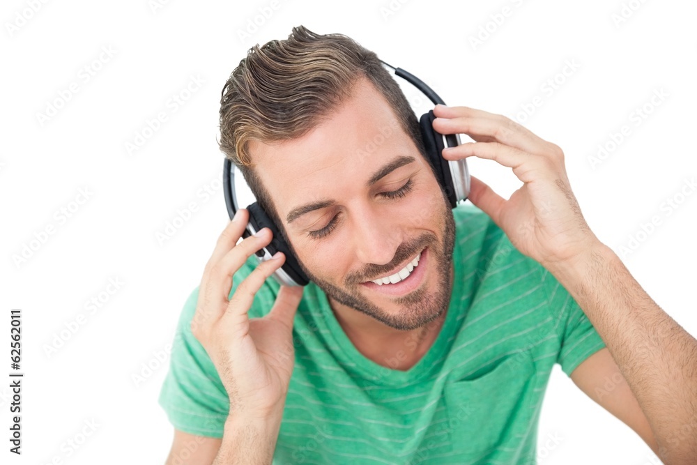 Close-up of a young man enjoying music Close-up of a young man enjoying music