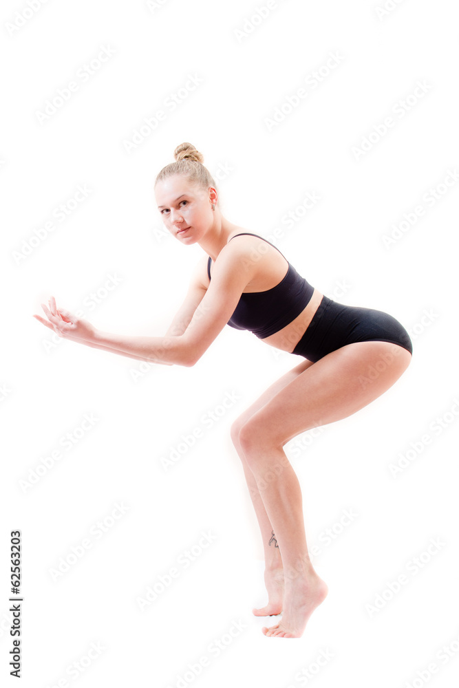 athletic woman in black suit on white background athletic woman in black suit on white background