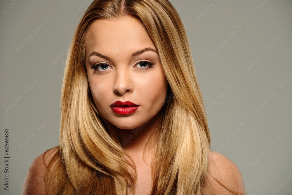 Beautiful young woman with seductive red lips Beautiful young woman with seductive red lips