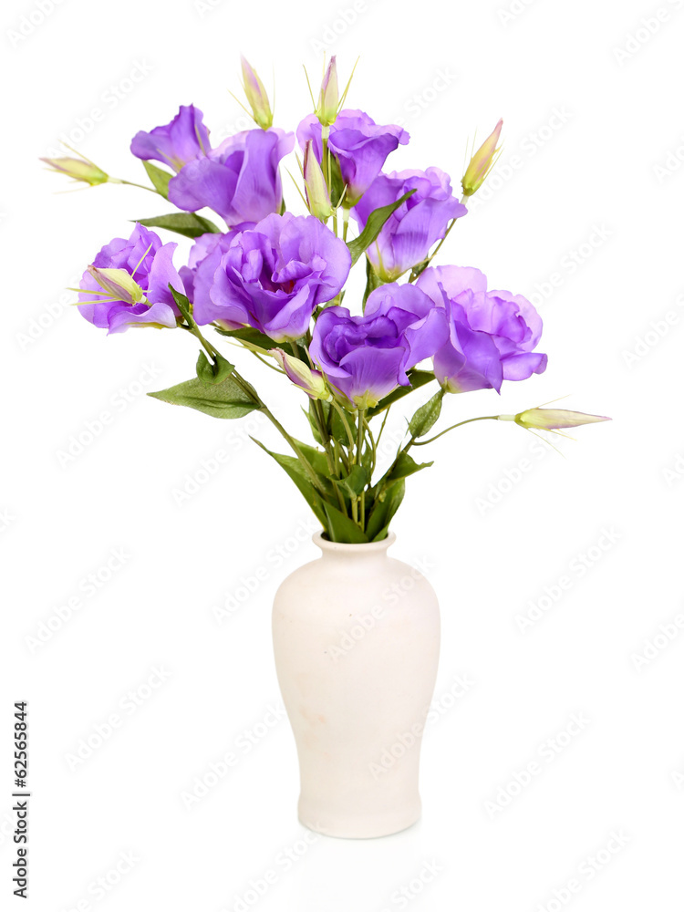 Purple artificial eustoma in vase isolated on white Purple artificial eustoma in vase isolated on white