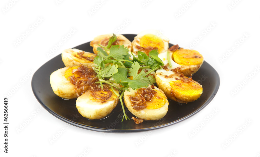Dish of Thai traditional food - Egg with tamarind sauce Dish of Thai traditional food - Egg with tamarind sauce