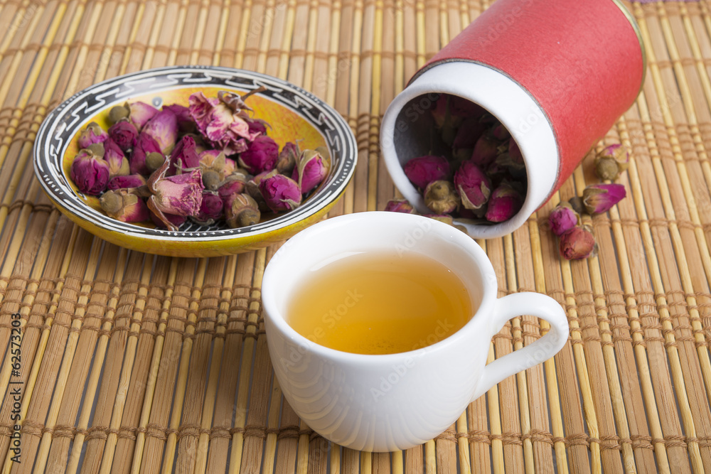 natural tea with flowers in Oriental setting natural tea with flowers in Oriental setting