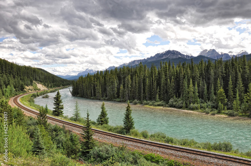 river, railway and Rocky Mountains in Banff National Park