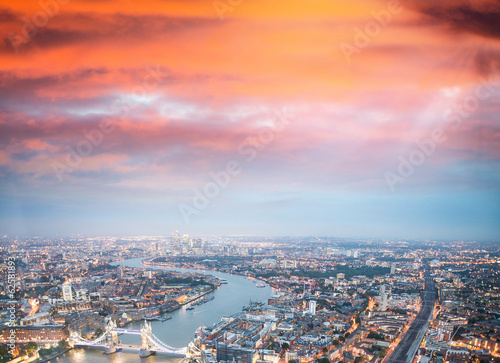 Tower Bridge and London skyline at night © jovannig