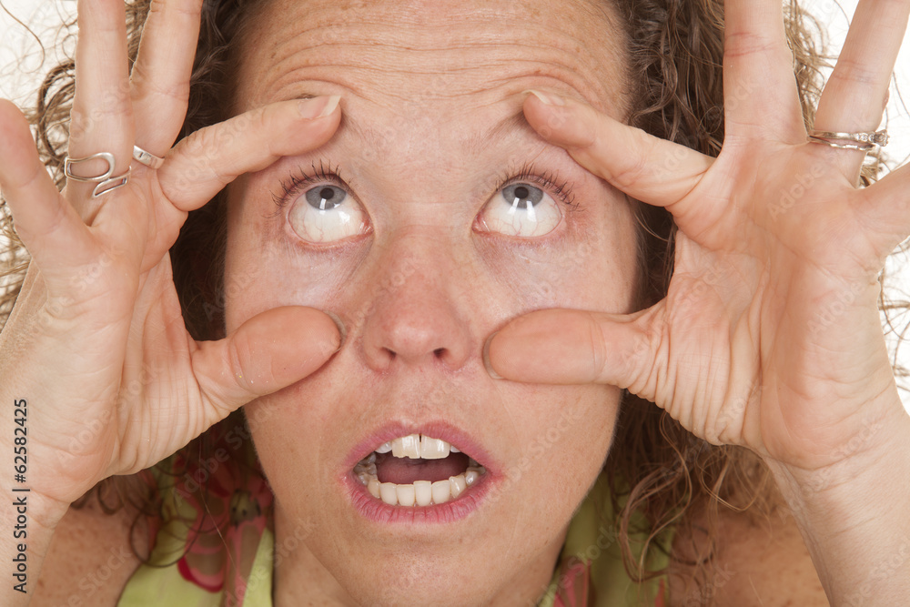 woman head close hands make eyes wide woman head close hands make eyes wide