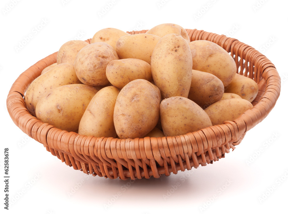 Potato tuber in wicker basket isolated on white background Potato tuber in wicker basket isolated on white background