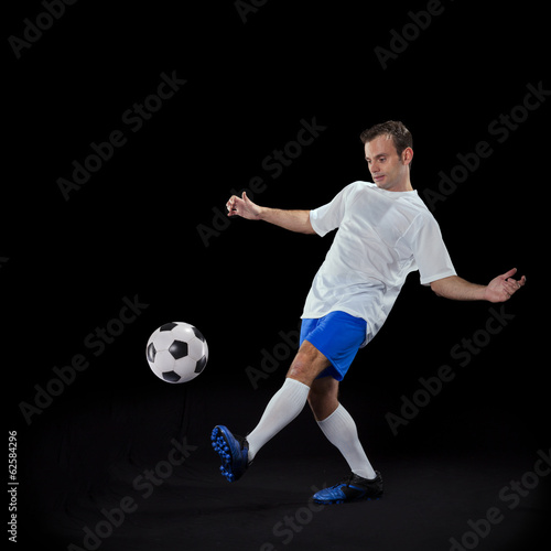 Soccer player with a ball © Helder Almeida