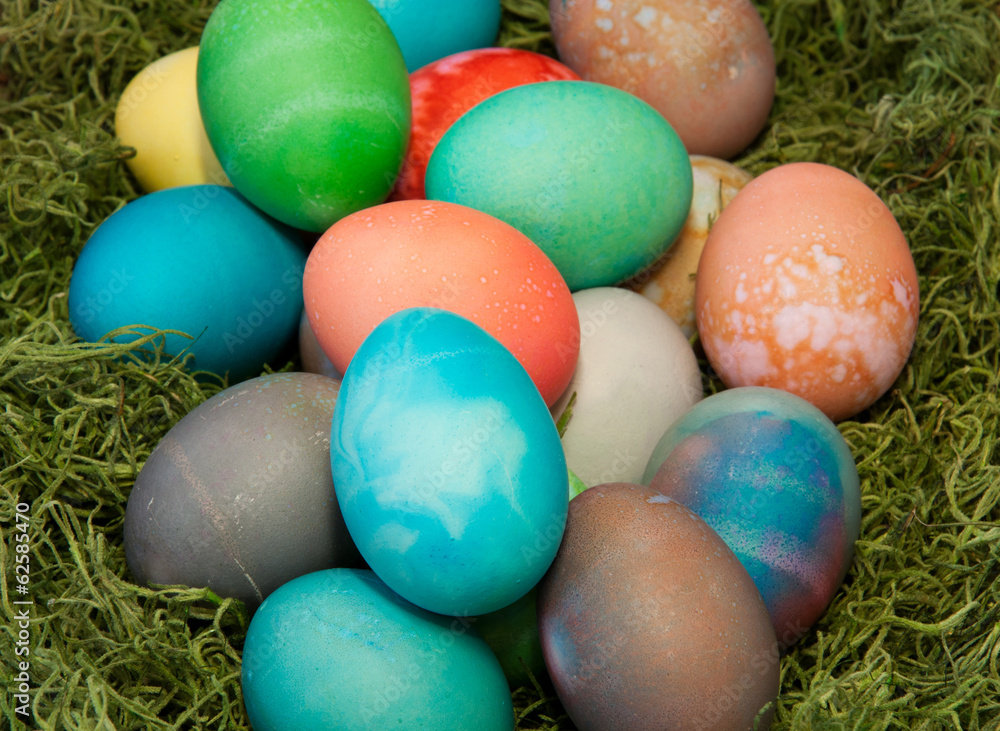 Multicolored Easter eggs in a pile. Multicolored Easter eggs in a pile.