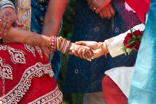 Bride and Groom holding hands