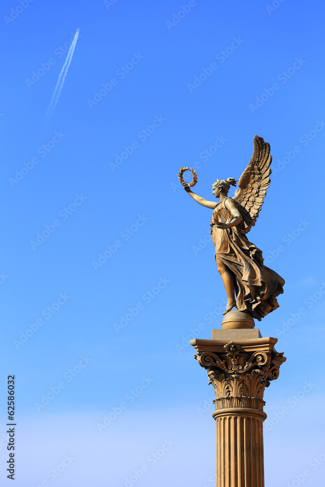 Golden Angel in front of House of Artists, Prague