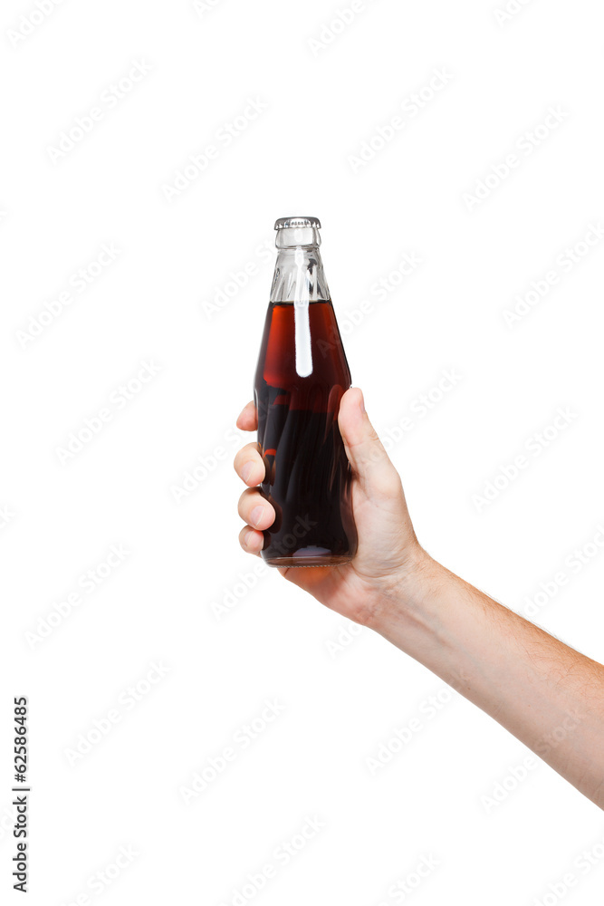 hand holding a bottle of cola on white background hand holding a bottle of cola on white background