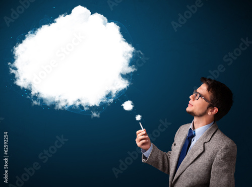 Young man smoking unhealthy cigarette with dense smoke