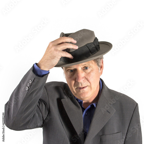 man with hat in elegant suit