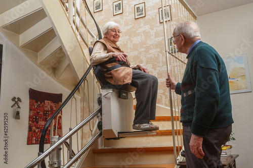 elderly couple at the stairlift