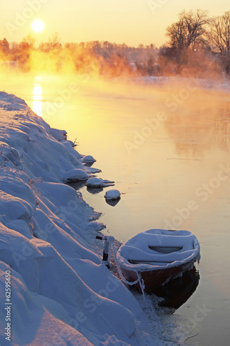 Winter sunset with boat. Зимний закат с лодкой