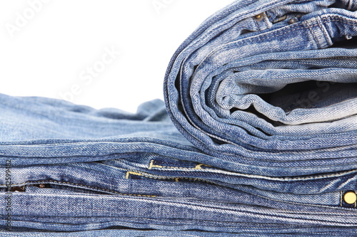 Lot of different blue jeans close - up
