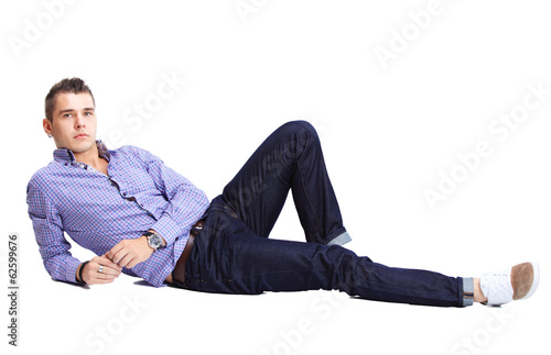 Flirtatious man sitting on the floor © opolja