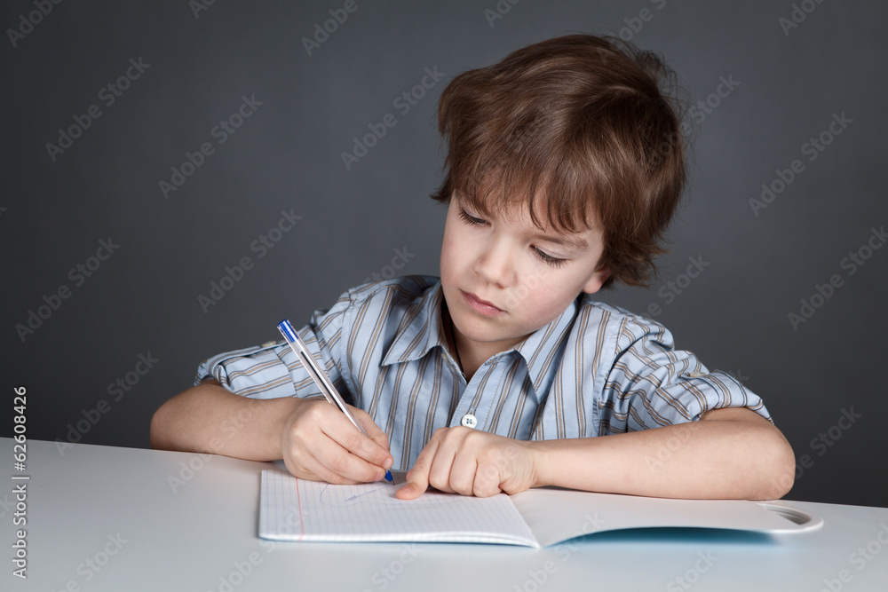 Thinking student sitting at desk Thinking student sitting at desk
