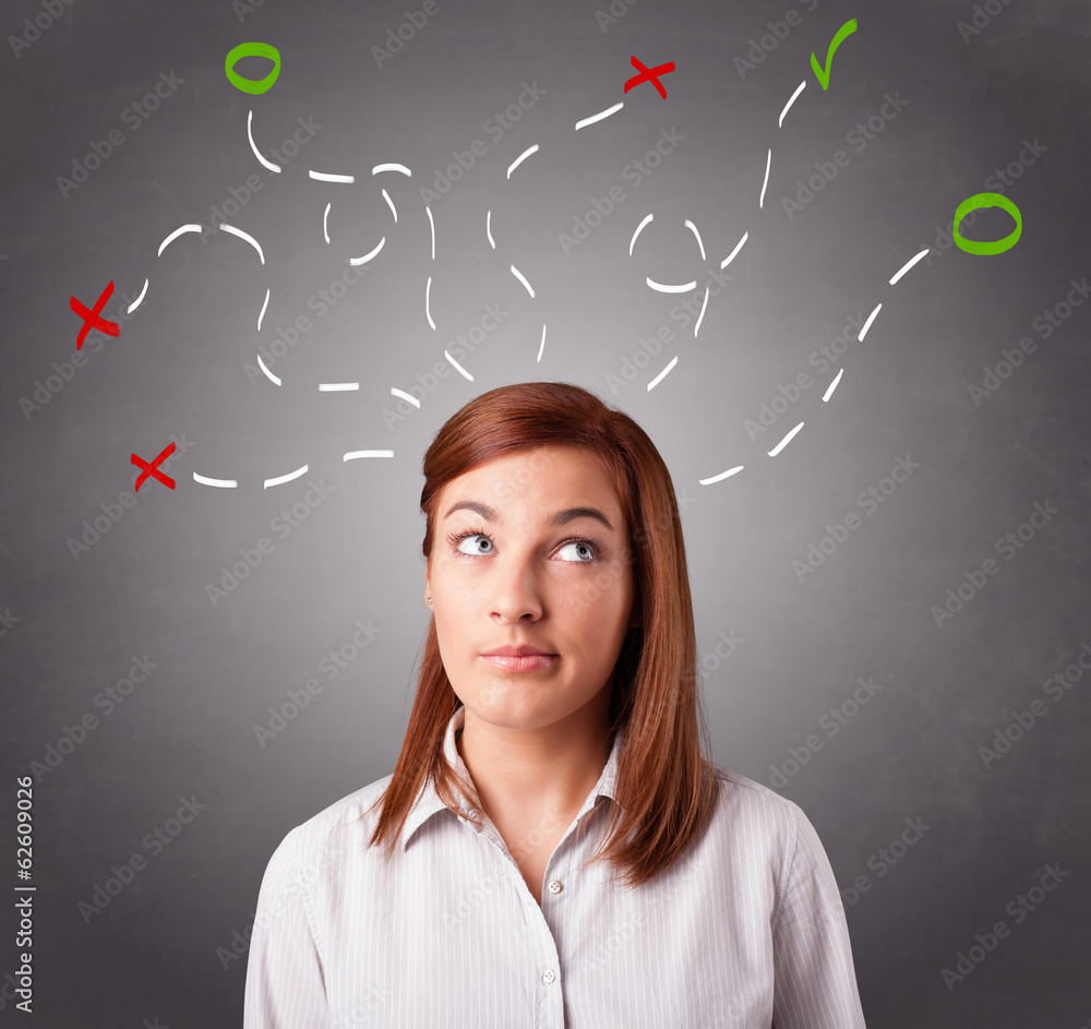 Young woman thinking with abstract marks overhead