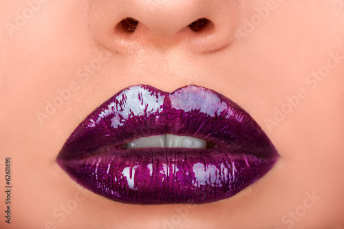 Macro photo of woman's lips with lipstick