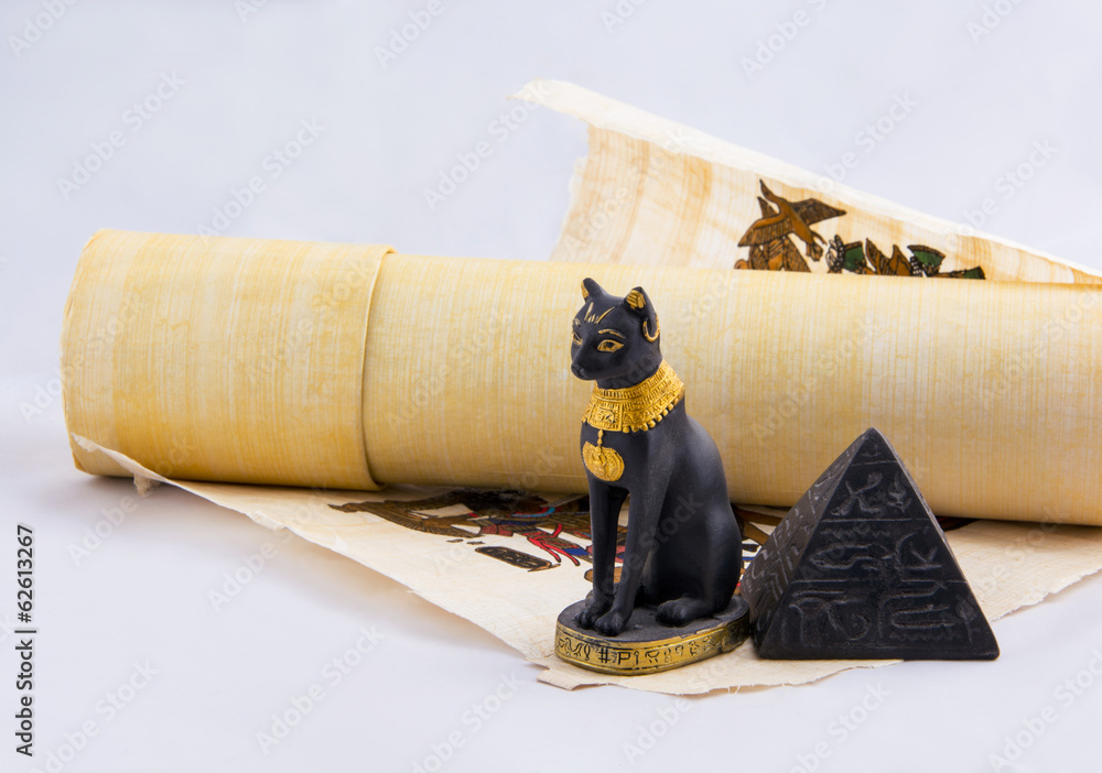 Egyptian cat, a pyramid and papyrus - souvenirs from travels