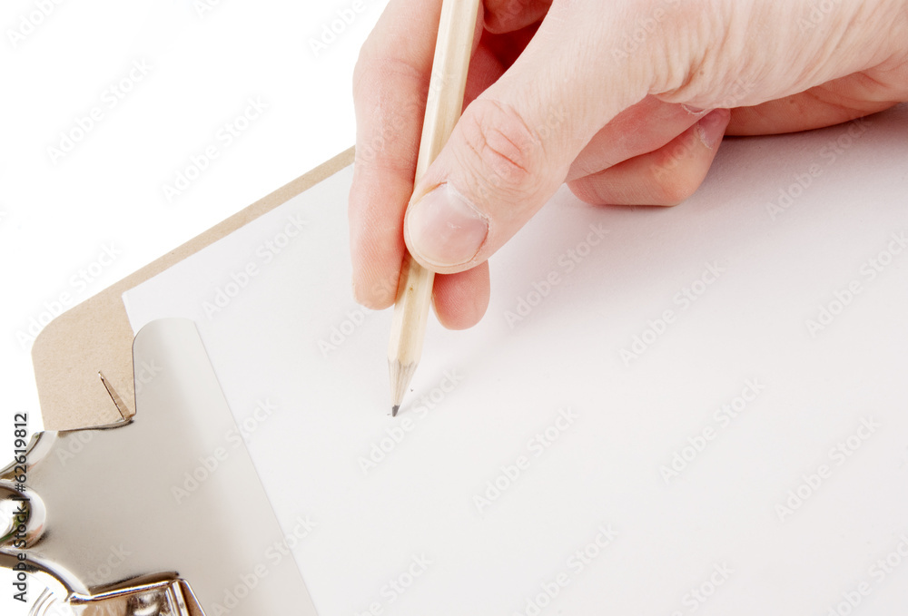 Hand writing on empty document in a clipboard Hand writing on empty document in a clipboard