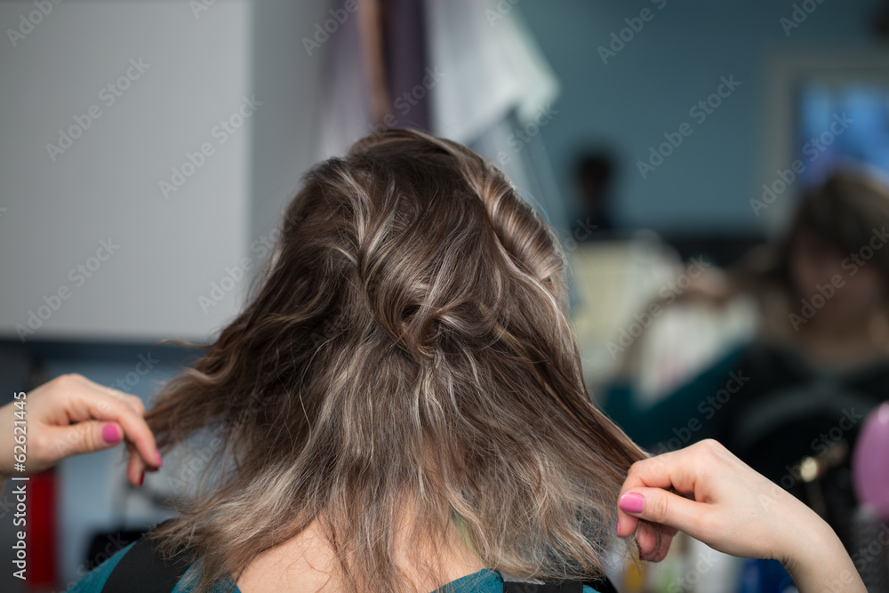 Fototapeta premium wrap curling hair in a beauty salon