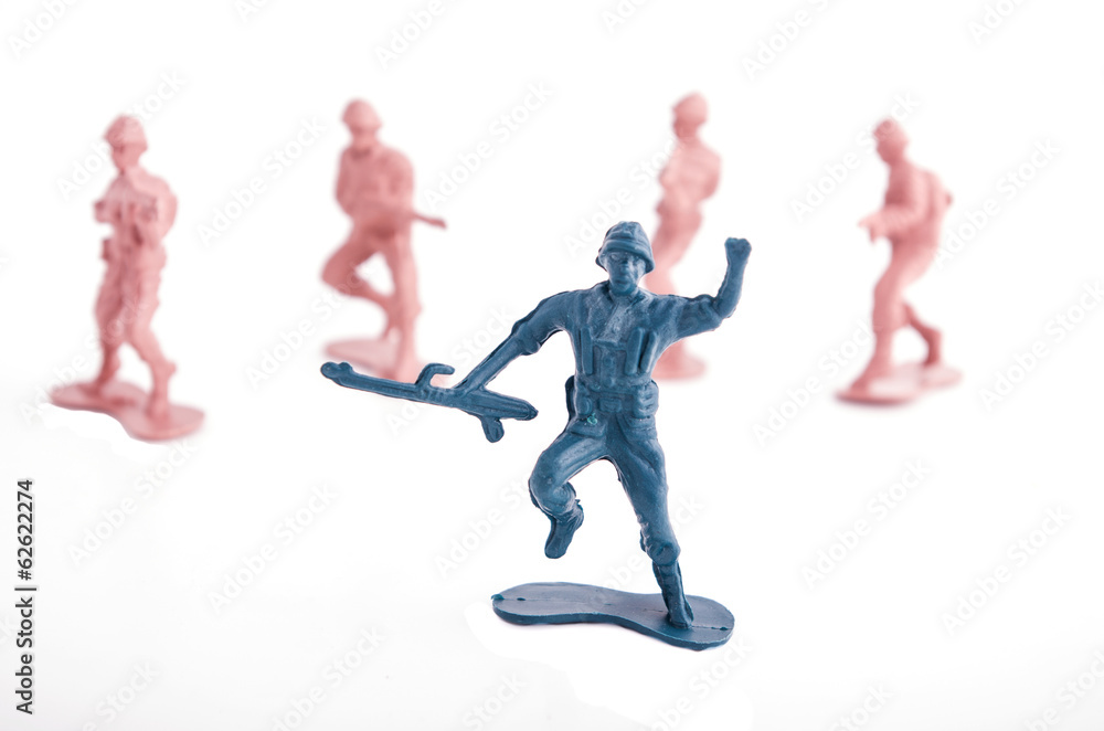 toy blue and pink soldiers on a white background