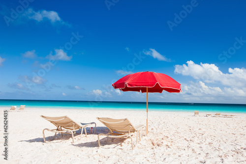 Chairs and umbrellas on a tropical beach