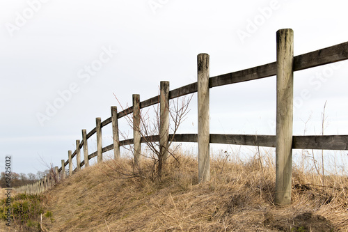 wooden fence in rural landscape