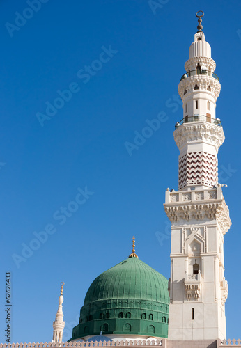 Schilderij op canvas Towers of the Nabawi mosque againts blue sky