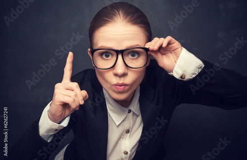 Φωτογραφία Funny strict teacher with glasses shakes his finger