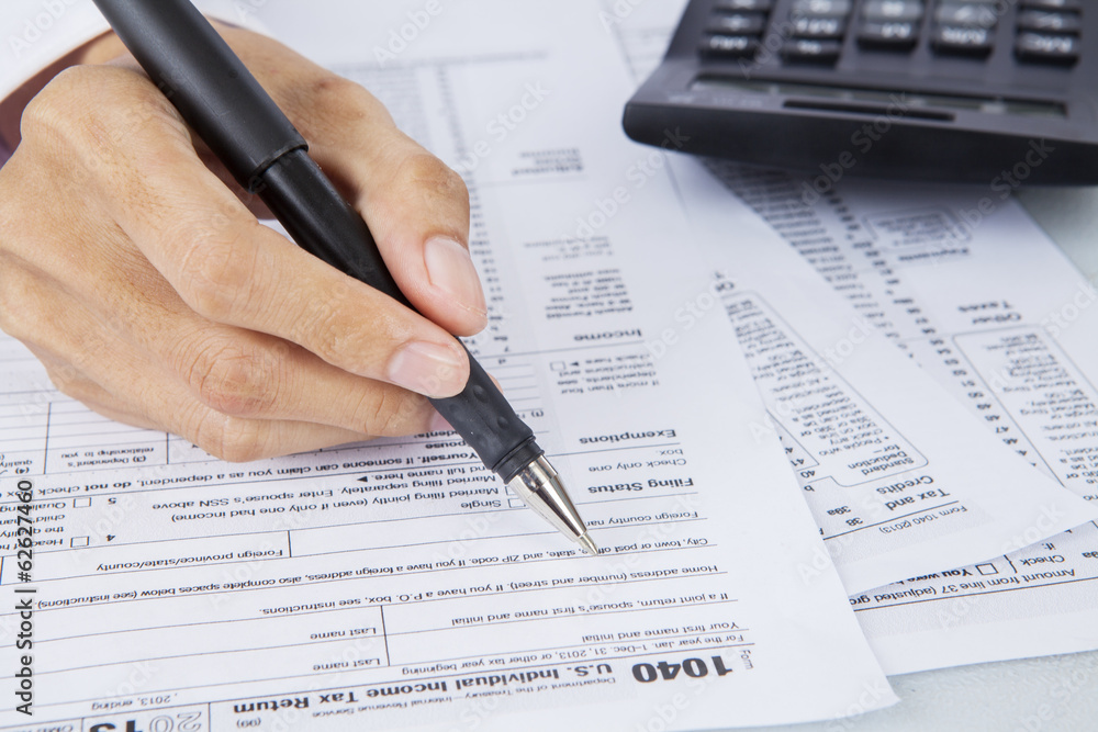 Filling out income tax forms Filling out income tax forms