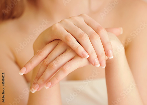 Woman hands with beautiful french manicure