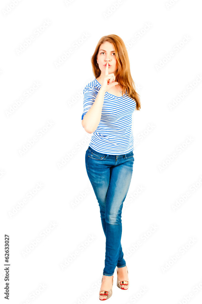 Beauty finger to her lips, studio shot Beauty finger to her lips, studio shot