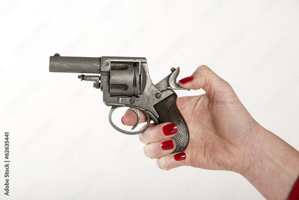 Woman cocking a gun