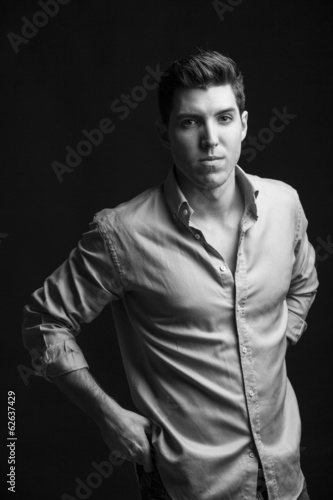 portrait of sexy man model doing a fashion shoot in the studio -
