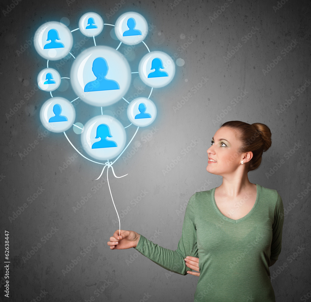 Woman holding social network balloon Woman holding social network balloon