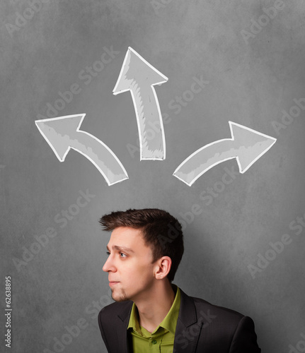 Businessman thinking with arrows above his head