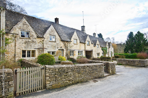 Traditional Cotswold cottages in England, UK. spring. photo