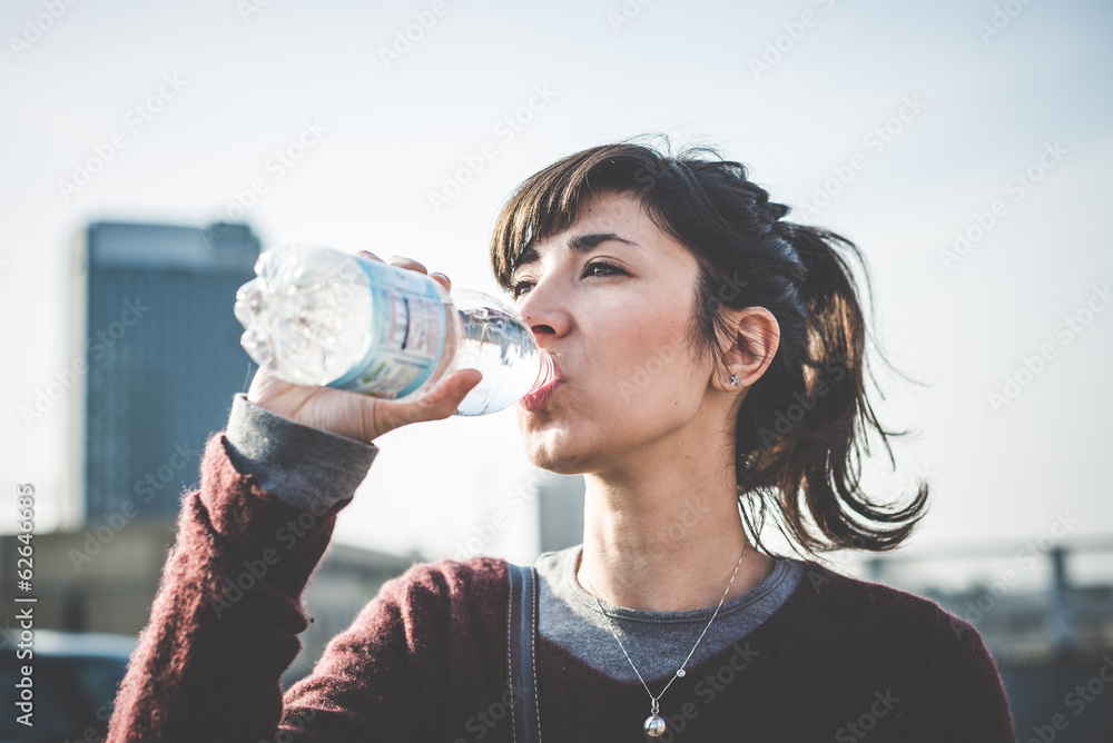 young beautiful hipster woman using smart phone young beautiful hipster woman using smart phone