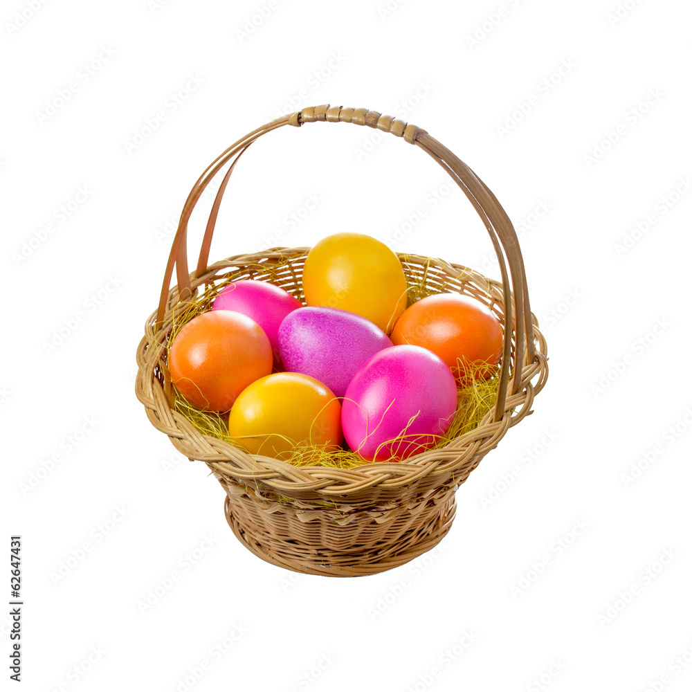 Osterkorb mit bunten Ostereiern Osterkorb mit bunten Ostereiern