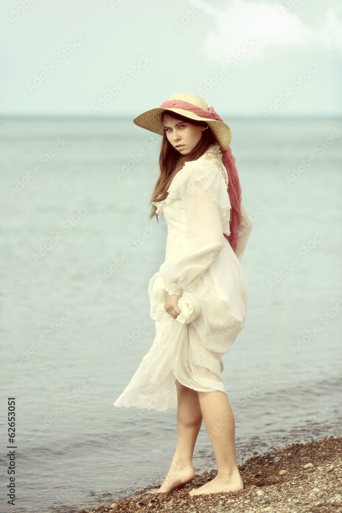 vintage young lady at the beach