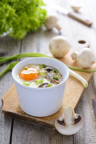 Baked egg with mushrooms and chive
